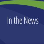 Text reads "In the News" on a blue background with a green wave design.