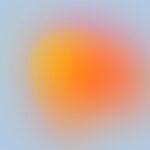 Abstract gradient with soft hues of yellow, orange, and pink against a light blue background.