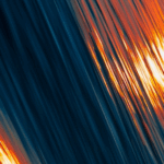 Diagonal streaks of blue and orange create an abstract pattern, resembling light reflections and motion.