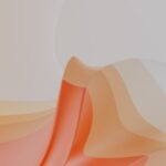 Abstract flowing shapes in soft orange and peach tones against a light gray background, creating a smooth, layered effect.