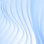 Wavy, translucent white patterns against a light blue background, creating a smooth and flowing texture.